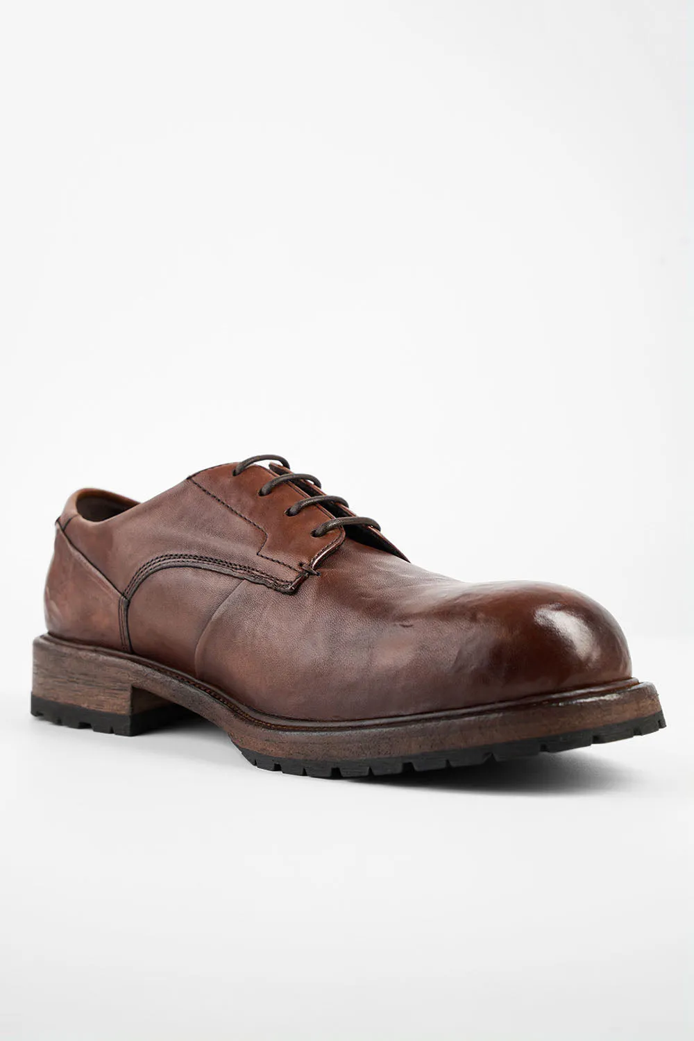 ROWLEY cognac folded derby shoes.