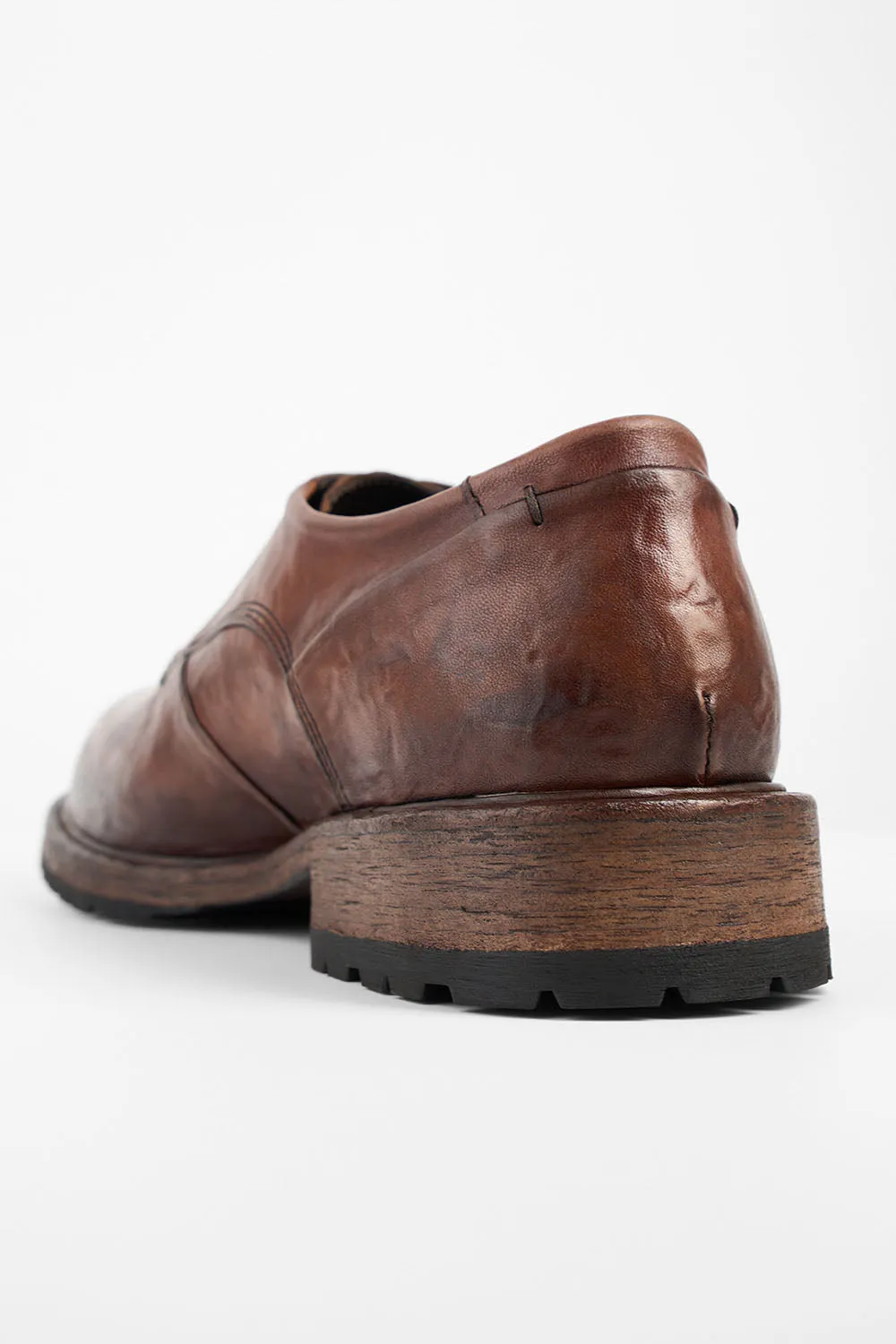 ROWLEY cognac folded derby shoes.